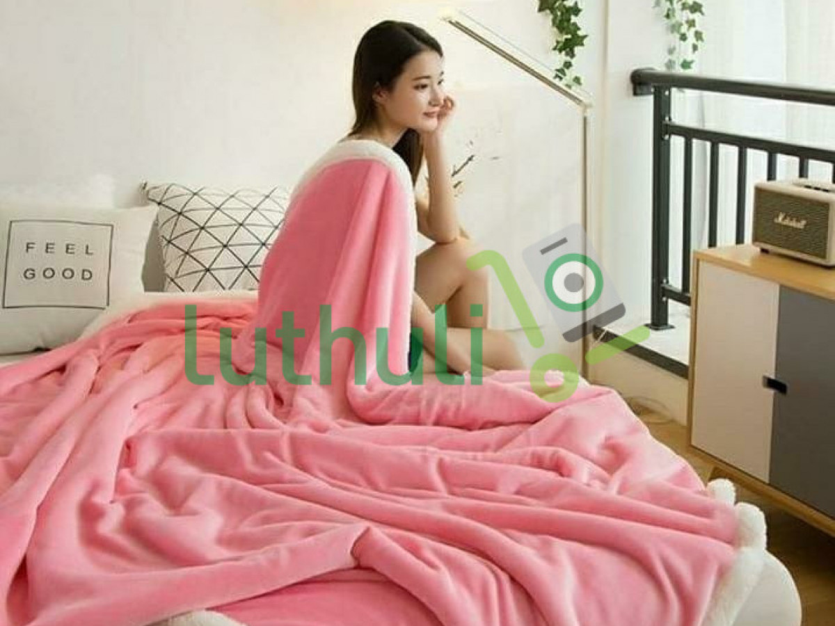 Pink Fuzzy Bed blanket. Pink Fuzzy Bed blanket.