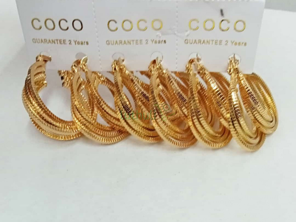 Fashion Elegant Female Hoop Earrings. Fashion Elegant Female Hoop Earrings.